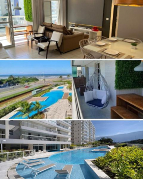 Home 1 | Ap Cinema Resort Frente Mar com Piscina Aquecida em Bertioga